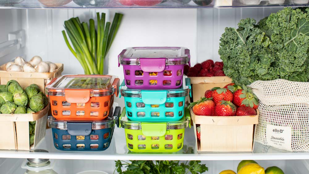 Interior of refrigerator, filled with fresh fruits and vegetables